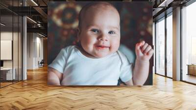 portrait of a little boy. cute baby. three month old boy smiling. baby with a pacifier Wall mural