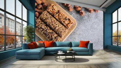 Health Bars and Mixed Nuts. Energy bars with almond and hazelnuts. Snack for healthy still life Wall mural