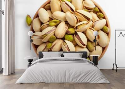 Pistachio top view isolated on a white background Wall mural