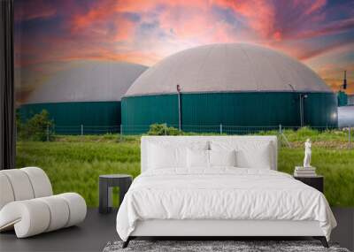 biogas tank in the field at sunset Wall mural