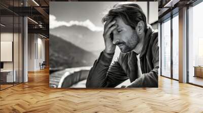 Loneliness, poverty, panic attack and depression ,Black and white photograph of a lonely young man Wall mural