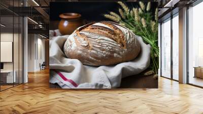 fresh baked rye bread on the kitchen table, still life in rustic style Wall mural