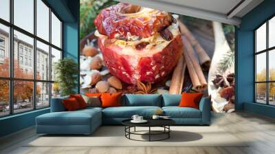 baked apple with christmas spices on wooden background Wall mural