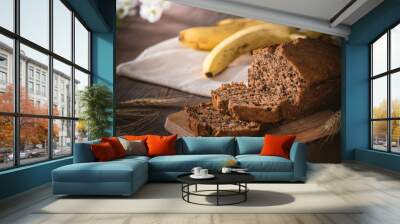 Fresh banana bread on rustic background Wall mural