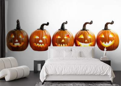 Five Halloween glowing lantern pumpkins in a row isolated on white background Wall mural