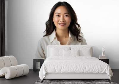 Portrait of a happy asian businesswoman working on laptop computer isolated over white background Wall mural