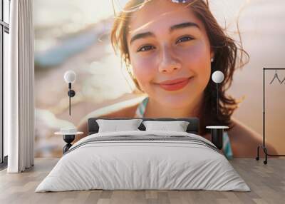 Portrait of a happy young female on the beach Wall mural