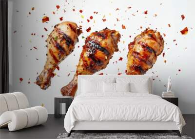 Tasty grilled chicken legs on white background Wall mural