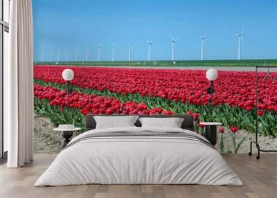 Fantastic landscape with windmills and tulip field in pastel col Wall mural