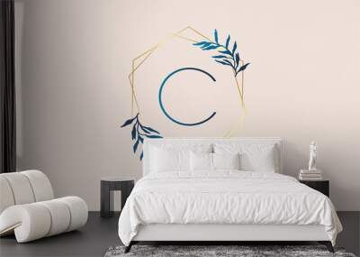 Letter C Logo with golden polygon frames and gradient blue leaves design. Wall mural