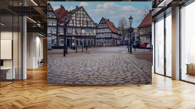 A square of an old german town with cobblestones and old houses. Celle. Germany Wall mural