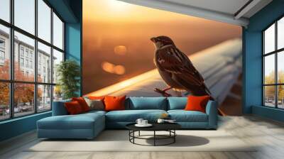  a bird sitting on the edge of an airplane wing at sunset or sunrise or sunset, with the wing of an airplane visible in the background. Wall mural