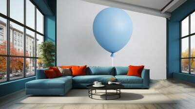  A blue balloon drifts in the sky, tethered by strings at both ends Wall mural