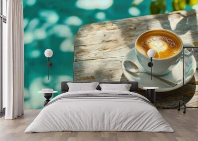   A cup of cappuccino sits on a white saucer atop a wooden table Wall mural