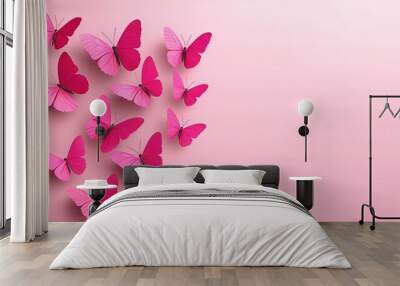   A group of pink butterflies flying in the air on a pink background, with shadows Wall mural