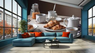  a table topped with plates of pastries and cups of tea and coffee next to a pitcher of orange juice and a pitcher of orange juice.  generative ai Wall mural