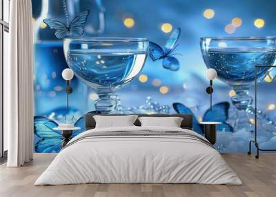   Close-up of two glasses filled with water and a butterfly perched on one of the rims Wall mural