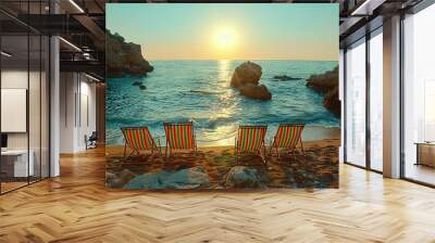   Two beach chairs on a sandy shore by the ocean during a sunset Wall mural