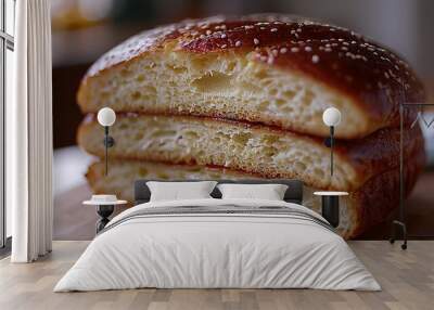   Two slices of bread on a wooden cutting board with a knife Wall mural