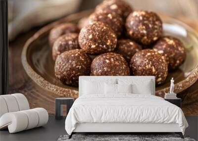 A plate of raw energy balls made from dates, nuts, and cacao Wall mural