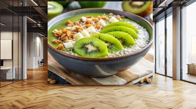 A vibrant green smoothie bowl topped with granola and sliced kiwi on a rustic wooden table, perfect for a healthy breakfast Wall mural