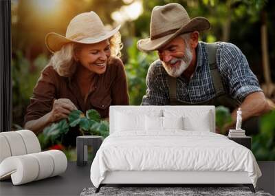 An elderly couple, dressed in hats and casual clothing, smiles while planting flowers and herbs in their lush garden during a beautiful sunset, creating lasting memories together Wall mural