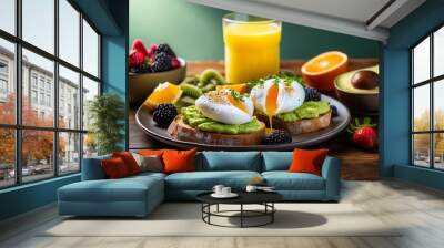 An inviting breakfast scene with avocado toast, poached eggs, sliced avocado, and a fresh fruit salad. The setup includes a glass of orange juice, whole and halved avocados, and oranges. Wall mural