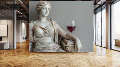 arrogant portrait of a sculpture of aphrodite with wine glass in hand on paste background with copy  Wall mural