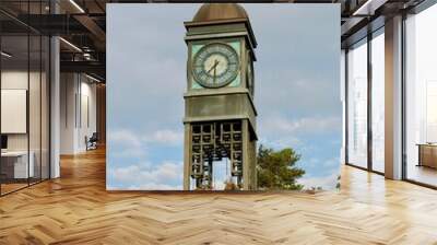 Clock tower on blue sky background Wall mural