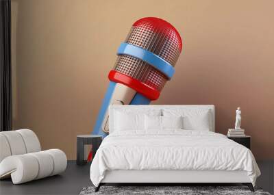 Colorful microphone with red, blue, and beige details, featuring a metallic mesh head and a button on the handle. The microphone is positioned diagonally against a beige background. Wall mural