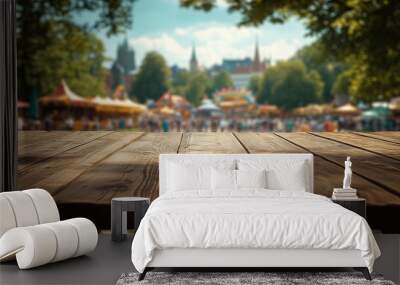 empty wooden table with blurred bavarian oktoberfest on open air background Wall mural