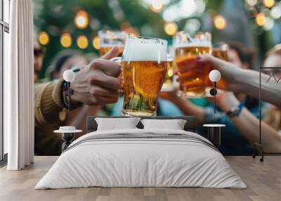 Friends toasting with beer mugs at an outdoor gathering during a festive evening. Celebration, social event, friendship, outdoor party, beer festival, group activity, camaraderie concept. Wall mural