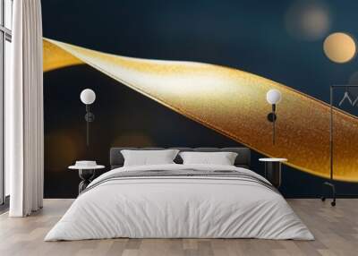 Golden ribbon twirling against a bokeh lights background Wall mural