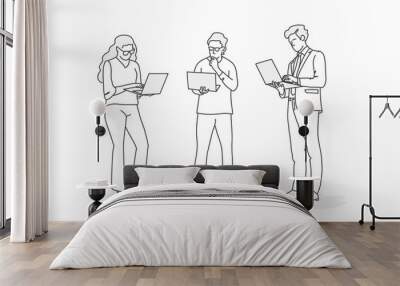 Hand drawn vector illustration of people are using laptops. Wall mural