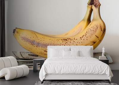 Healthy Finance Concept: Two Bananas Resting on Stacked US Dollar Bills Wall mural