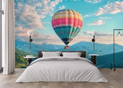 Hot air balloon soaring over serene mountain landscape Wall mural