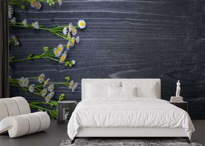 Field delicate lilac flowers on a dark wooden background Wall mural