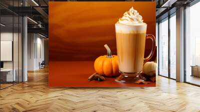 pumpkin latte with whipped cream and cinnamon on orange background with pumpkins, copy space Wall mural