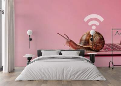 low internet speed. snail on laptop and wifi icon Isolated on solid color background Wall mural