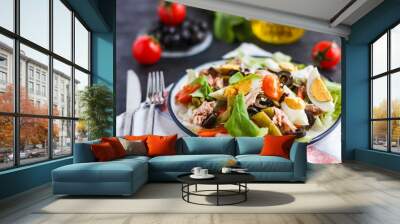 Nicoise salad with tuna, green beans, basil and fresh vegetables Wall mural