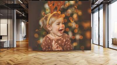 Baby on kid's Christmas party Wall mural