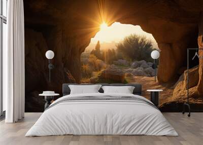 Open empty tomb of Jesus with sunset view Wall mural