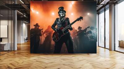 Photo of a musician with a skull face playing a guitar Wall mural