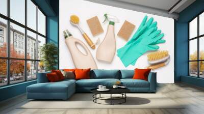 Brushes, sponges, rubber gloves and natural cleaning products on white background.  Eco-friendly cleaning products Wall mural