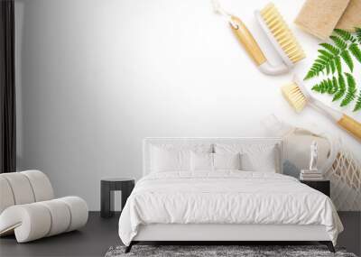 Eco brushes, sponges and rag on white background. Flat lay eco cleaning products. Cleaner concept  Wall mural