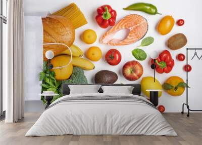 Healthy food  background. Vegetables, fruits, bread, pasta and salmon in paper bag. Variety balanced of healthy food products on white background Wall mural