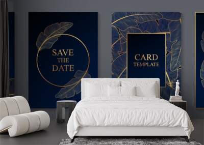 Wedding invitation design or greeting card templates with golden feathers on a dark blue background. Wall mural