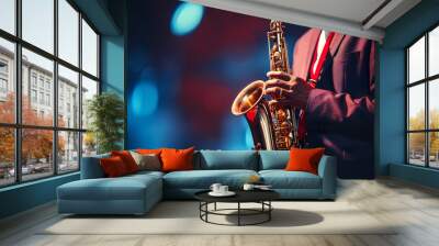 Saxophonist playing the saxophone on stage, close-up Wall mural