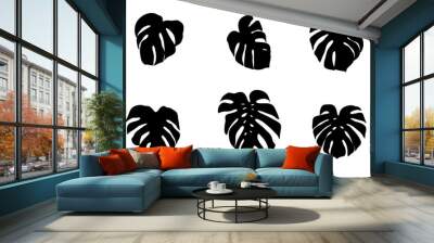 Set of vector silhouettes of monstera leaves Wall mural