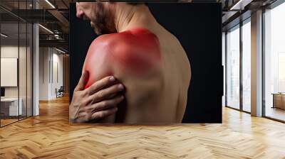 Shoulder bone muscle and nerve sore pain, man holding injured shoulder joint highlighted arthritis trauma zone. Wall mural